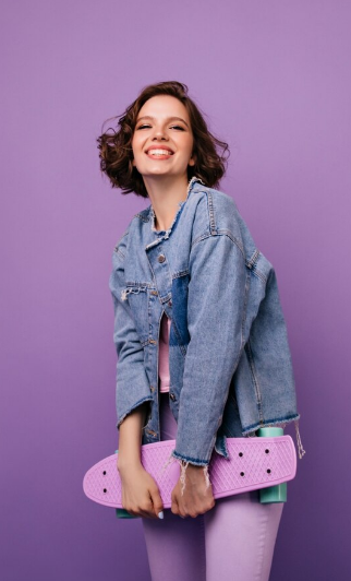 Portrait of a woman standing in black.